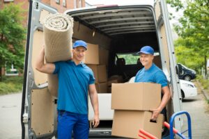 A professional commercial movers in nyc are moving a boxes in the building