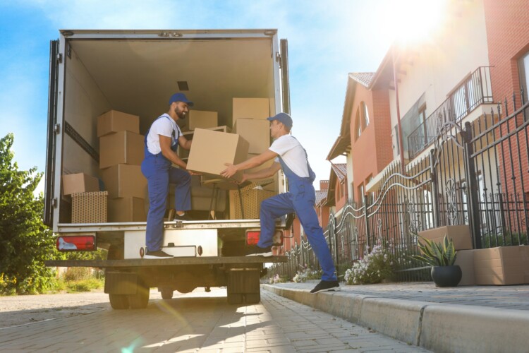 One men take a moves box to another men in new jersey